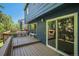 A spacious deck with a dining set offers a relaxing outdoor space, perfect for entertaining and enjoying warm weather at 9640 Moss Rose Cir, Highlands Ranch, CO 80129