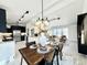 Open concept dining area, flows into kitchen and living room at 1931 S Locust St, Denver, CO 80224