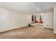 Finished basement featuring comfortable built-in window seating and neutral carpeting at 9546 High Cliffe St, Highlands Ranch, CO 80129