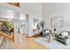 Living room featuring hardwood floors and decor at 9546 High Cliffe St, Highlands Ranch, CO 80129