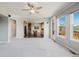 Bright, open-concept living area flows into kitchen, offering ample space and natural light at 3126 Aspen Creek Dr, Highlands Ranch, CO 80129