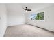 Bright bedroom with natural light and a ceiling fan at 12678 W Dorado Pl, Littleton, CO 80127