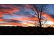 Take in fiery sunsets and silhouettes from this picturesque property at 11904 W Auburn Dr, Denver, CO 80228
