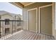 An outdoor patio/balcony showing two utility closets and an overview of the complex at 9185 Wilde Ln # 301, Parker, CO 80134