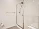 Modern bathroom showcasing a glass-enclosed shower with white subway tile and a built-in bench at 9185 Wilde Ln # 301, Parker, CO 80134