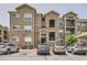 Apartment building exterior showcasing architectural details and convenient parking at 9185 Wilde Ln # 301, Parker, CO 80134