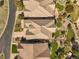 Aerial view of home showing landscaped backyard and neighboring properties at 10687 Featherwalk Way, Highlands Ranch, CO 80126