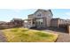 Landscaped backyard with fenced perimeter, with lush green space at 24325 E Ada Pl, Aurora, CO 80018