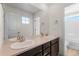This bathroom features a double sink vanity, offering style and functionality at 24325 E Ada Pl, Aurora, CO 80018