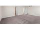 Bedroom featuring a doorway to the ensuite bathroom and a separate closet at 24325 E Ada Pl, Aurora, CO 80018