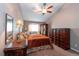 Primary bedroom featuring a ceiling fan, and furnishings with ample storage space at 12242 Bannock Cir # D, Denver, CO 80234