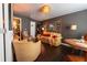 Comfortable living room with hardwood floors, stylish decor, and ample natural light creates a welcoming ambiance at 12242 Bannock Cir # D, Denver, CO 80234