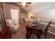 Cozy office with vaulted ceilings, ceiling fan and a view of the stairs at 12242 Bannock Cir # D, Denver, CO 80234