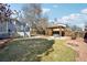 An inviting backyard features a wooden gazebo, and a relaxing hot tub at 8280 Everett Way, Arvada, CO 80005