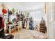 Well organized closet featuring built in vanity and natural lighting at 8280 Everett Way, Arvada, CO 80005