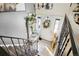 Charming entryway with staircase, stylish bench, and decorative wreath on the front door at 8280 Everett Way, Arvada, CO 80005