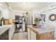 Well-appointed kitchen with modern appliances, an island, and ample counter space at 8280 Everett Way, Arvada, CO 80005