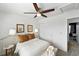 Bedroom features a ceiling fan, bright, natural light, and a neutral color palette at 11985 Singing Winds St, Parker, CO 80138