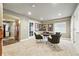 Spacious rec room featuring a poker table, stylish chairs, and neutral tones at 11985 Singing Winds St, Parker, CO 80138