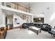 Spacious living room with high ceilings, and an open floor plan, perfect for entertaining at 11985 Singing Winds St, Parker, CO 80138