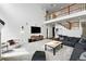 Bright and airy living room features a spacious layout and modern decor at 11985 Singing Winds St, Parker, CO 80138