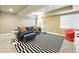 Comfortable living room with modern decor, plush sofa, stylish rug, and natural light at 11985 Singing Winds St, Parker, CO 80138