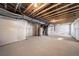 Unfinished basement with exposed ceiling and roughed-in mechanicals, ready for customization at , Aurora, CO 80019
