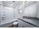Cozy bathroom featuring a shower-tub combo and granite countertops at , Aurora, CO 80019