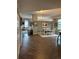 Open dining area featuring hardwood floors, neutral paint, and modern lighting at 475 W 12Th Ave # 4E, Denver, CO 80204