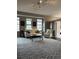Comfortable living room area featuring city views, a modern couch, and patterned rug at 475 W 12Th Ave # 4E, Denver, CO 80204