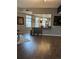 Inviting open-concept living space with dark hardwood floors and updated kitchen at 475 W 12Th Ave # 4E, Denver, CO 80204