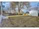 Expansive backyard featuring a storage shed and privacy fence, perfect for outdoor activities at 5235 Dover St, Arvada, CO 80002