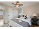 Comfortable bedroom with a ceiling fan and hardwood flooring at 5235 Dover St, Arvada, CO 80002