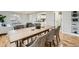 Dining room with a long table and seating for eight guests at 5235 Dover St, Arvada, CO 80002