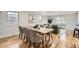 Dining area with a long table and seating for eight at 5235 Dover St, Arvada, CO 80002