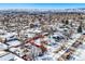 Aerial lot view of property during winter season at 11842 W 14Th Ave, Lakewood, CO 80401