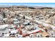 Aerial view showing house and lot in winter setting at 11842 W 14Th Ave, Lakewood, CO 80401