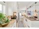 Bright kitchen features white cabinetry, granite countertops and stainless steel appliances at 432 N Ogden St, Denver, CO 80218