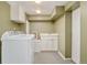 Laundry room featuring new washer and dryer, sink and neutral decor at 432 N Ogden St, Denver, CO 80218