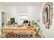 Office with a large rustic wooden desk, rug, decor, and natural light at 432 N Ogden St, Denver, CO 80218