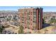 High-rise building showcasing multiple floors of apartments with views of the surrounding landscape at 1900 E Girard Pl # 1103, Englewood, CO 80113