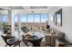 Modern living room with great city views through the expansive windows at 1900 E Girard Pl # 1103, Englewood, CO 80113