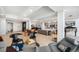 Bright and open living room with hardwood floors and expansive windows offering stunning city views at 1900 E Girard Pl # 1103, Englewood, CO 80113