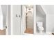 Compact bathroom with a stand up shower and modern white fixtures at 748 Elati St, Denver, CO 80204