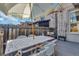 Outdoor deck with stylish dining table and chairs, perfect for entertaining guests at 748 Elati St, Denver, CO 80204