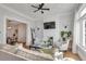 Cozy living room with a decorative fireplace, comfortable seating, and open layout at 748 Elati St, Denver, CO 80204
