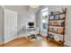 Bright home office with hardwood floors, a functional desk, and a cozy atmosphere at 748 Elati St, Denver, CO 80204