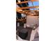 Cozy patio features a pergola, string lights, outdoor furniture, a fire pit, and potted plants at 748 Elati St, Denver, CO 80204