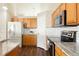 Bright and functional kitchen with stainless steel appliances, and granite countertops at 3461 Maple Cir, Brighton, CO 80601