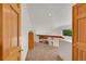 Hallway with carpet and wood railing at 766 Chimney Creek Dr, Golden, CO 80401